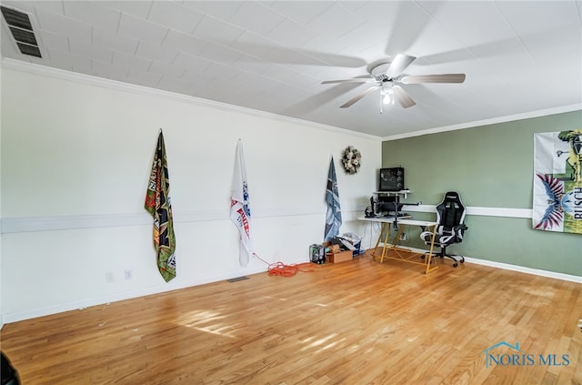 miscellaneous room with ceiling fan, hardwood / wood-style flooring, and ornamental molding