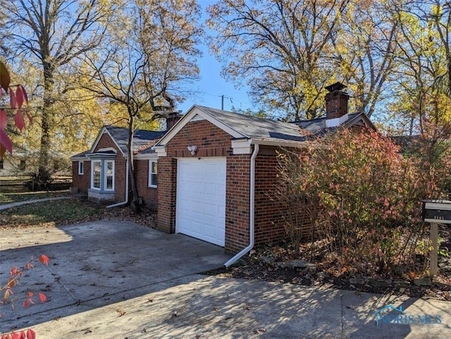 exterior space featuring a garage