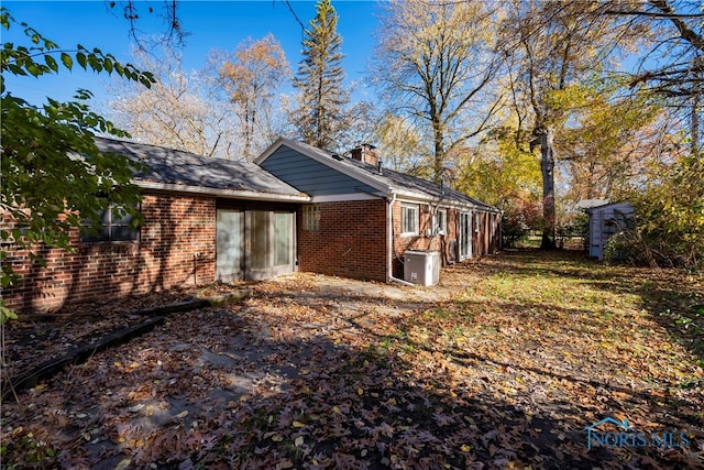 view of home's exterior featuring cooling unit