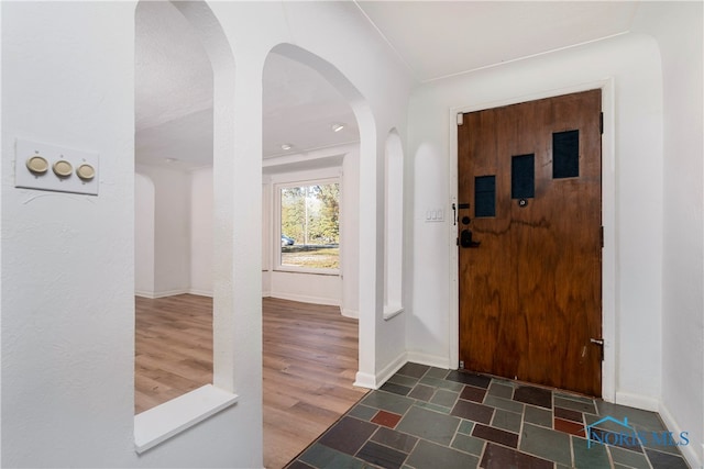 foyer featuring dark hardwood / wood-style flooring