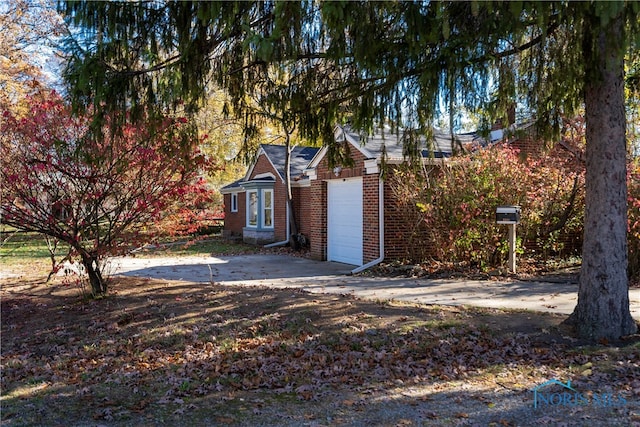 exterior space with a garage