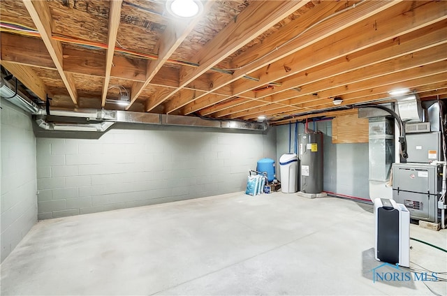 basement featuring electric water heater and heating unit