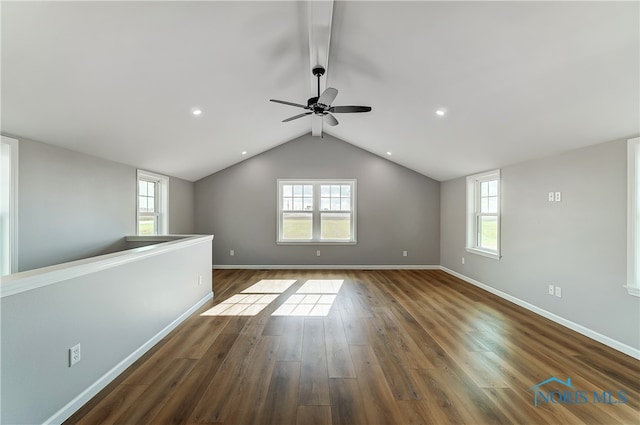 bonus room featuring dark hardwood / wood-style flooring, a healthy amount of sunlight, and vaulted ceiling