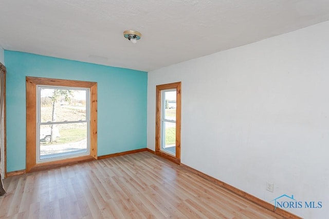 empty room featuring light hardwood / wood-style flooring