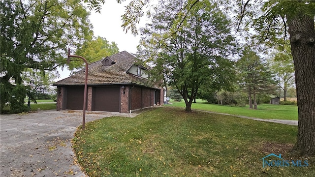 view of property exterior featuring a lawn