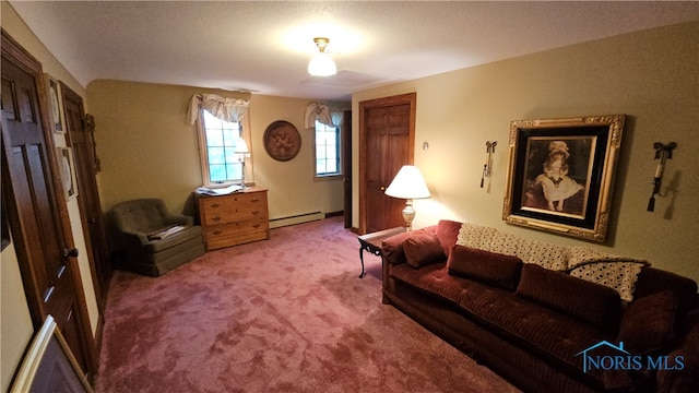 interior space featuring a baseboard heating unit and carpet floors