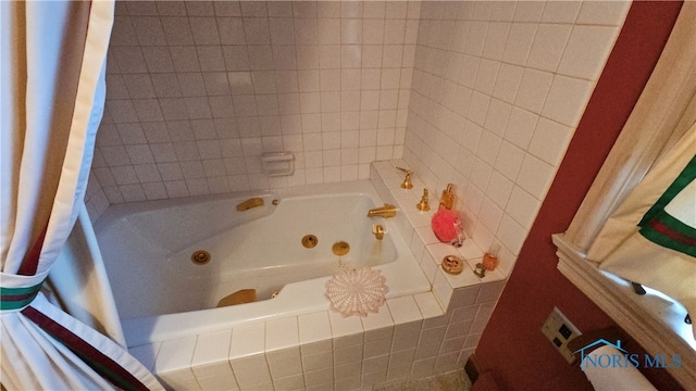 bathroom featuring a relaxing tiled tub