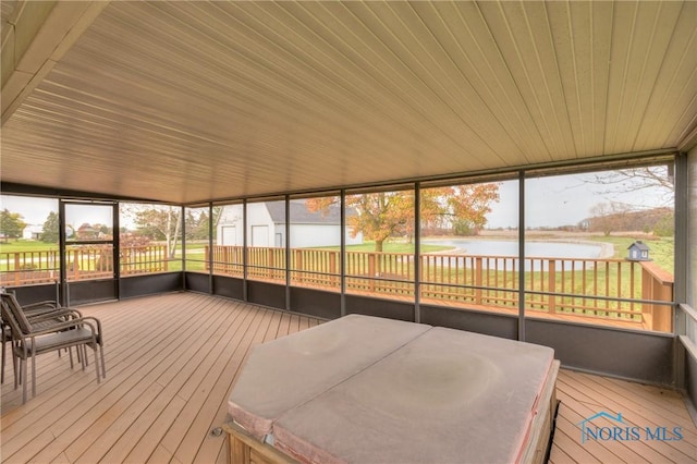7733 Brown Rd, Curtice, OH 43412 - sunroom / solarium featuring a water view, a hot tub, and healthy amount of natural light