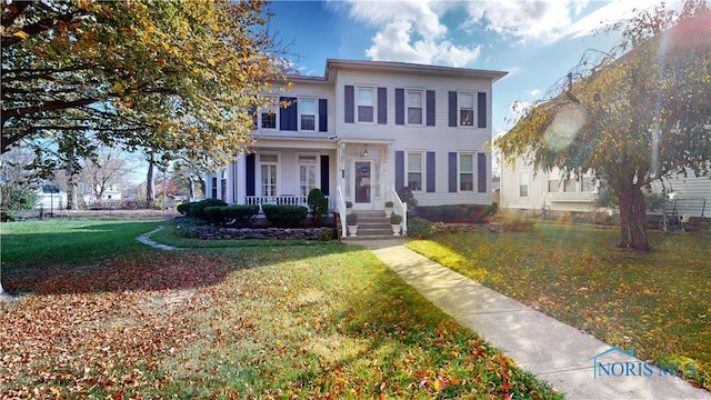 view of front of house with a front lawn