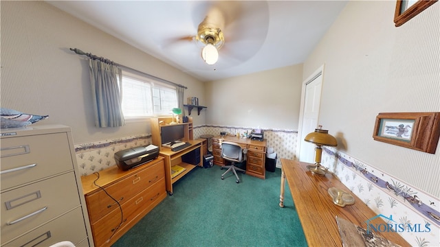 office with dark colored carpet and ceiling fan