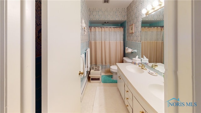 bathroom featuring tile walls, tile patterned floors, vanity, a shower with shower curtain, and toilet