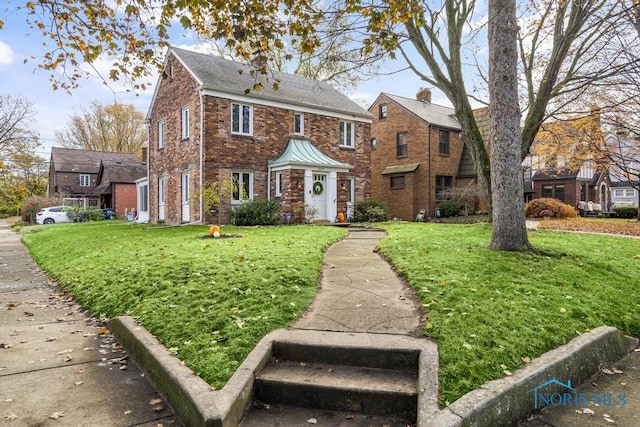 view of front facade with a front lawn