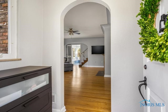 hall with light wood-type flooring