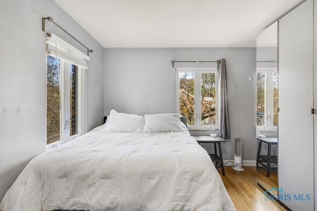 bedroom featuring light hardwood / wood-style floors