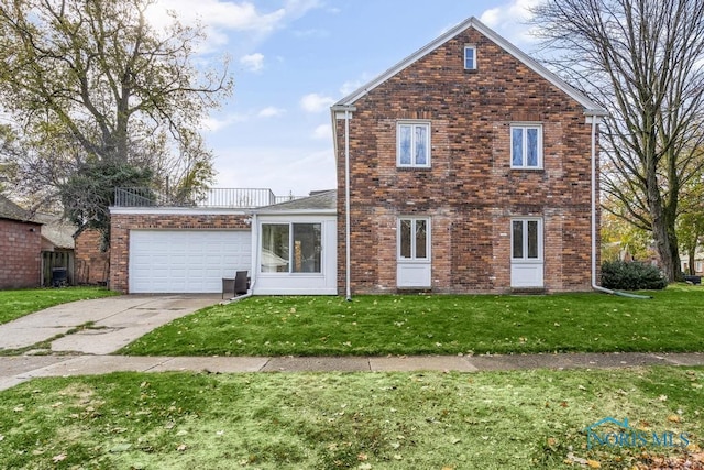 front of property with a garage and a front yard