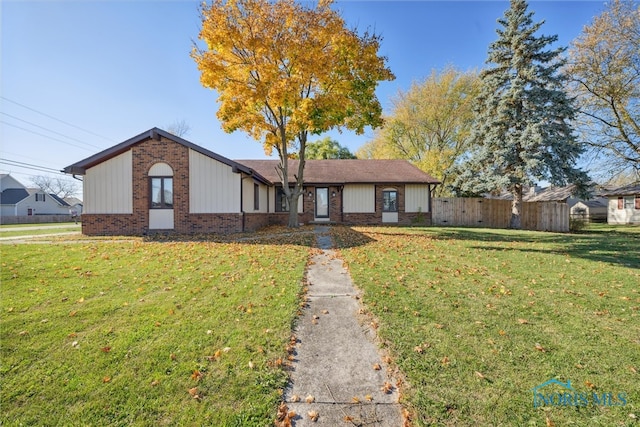 view of front of home with a front yard