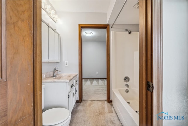 full bathroom with toilet, vanity, and shower / bathing tub combination