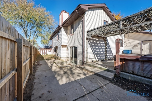 rear view of property with a patio