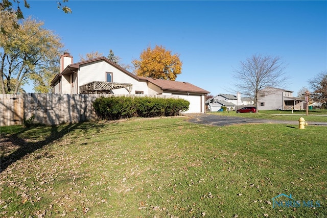 view of yard with a garage