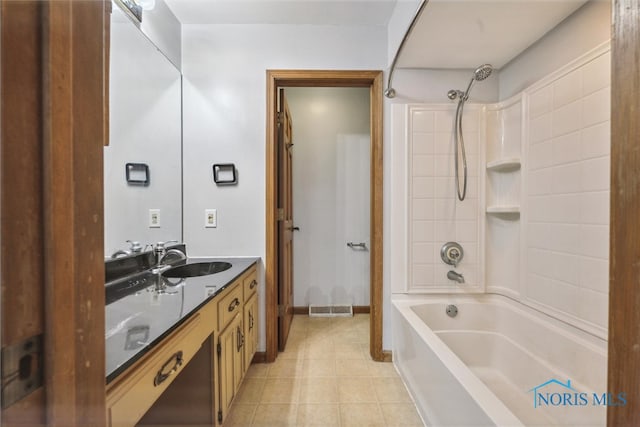 bathroom featuring vanity and shower / bathtub combination