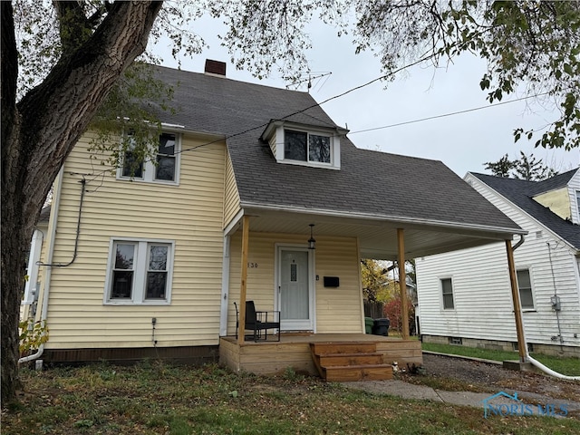 view of front of property featuring covered porch