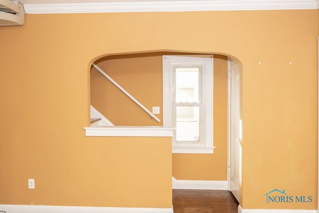 hall with wood-type flooring