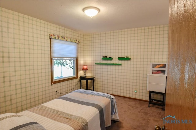 61 N Harbors End Dr, Port Clinton, OH 43452 - carpeted bedroom with wallpapered walls and baseboards