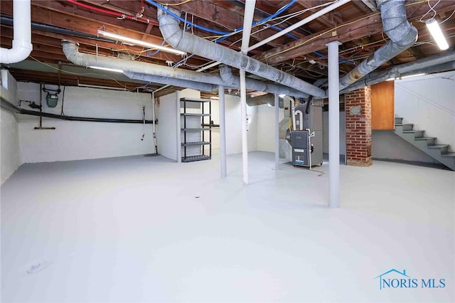 basement featuring heating unit