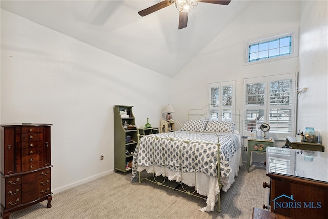 bedroom with light carpet, high vaulted ceiling, and ceiling fan