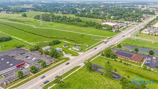 bird's eye view featuring a rural view and a water view