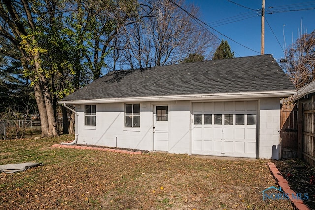 garage with a yard