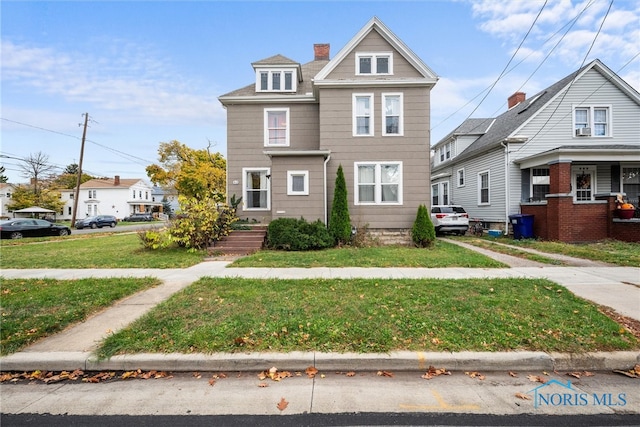 view of front of house featuring a front yard