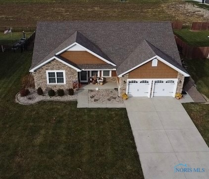 craftsman house with a garage