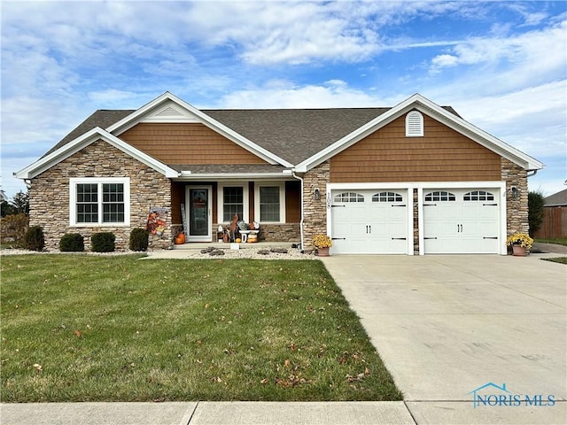 craftsman inspired home with a porch, a garage, and a front yard