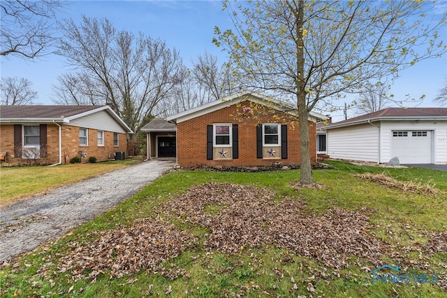 ranch-style home featuring central AC unit and a front lawn