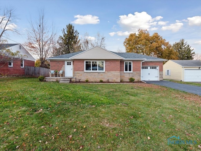 ranch-style house with a front lawn