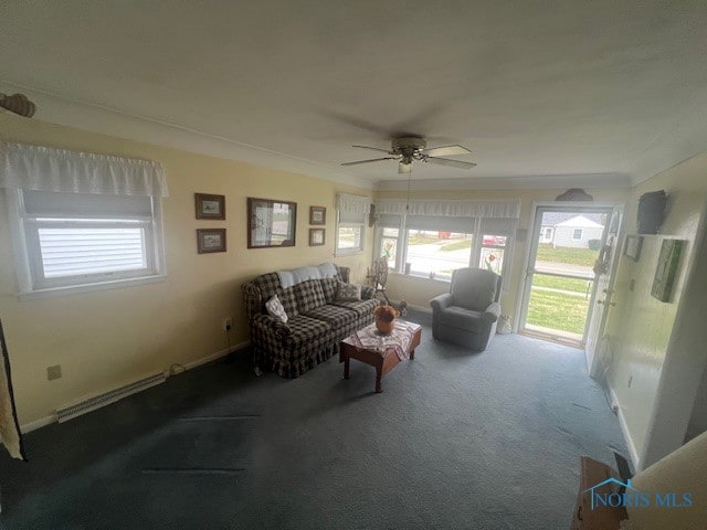 sunroom / solarium with ceiling fan