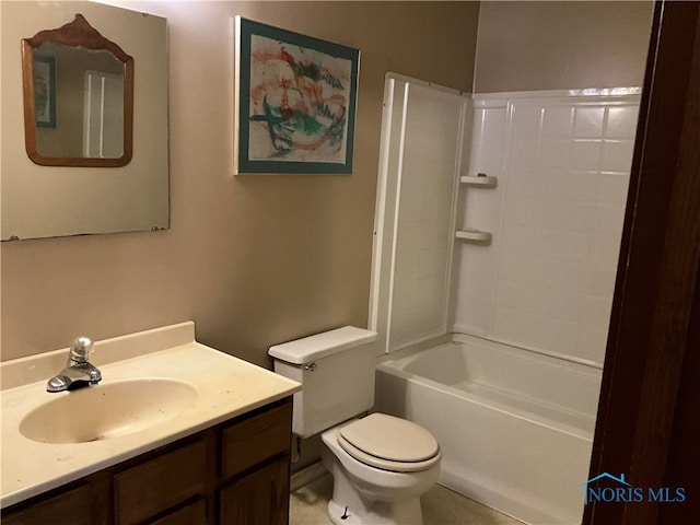 full bathroom featuring  shower combination, tile patterned flooring, vanity, and toilet