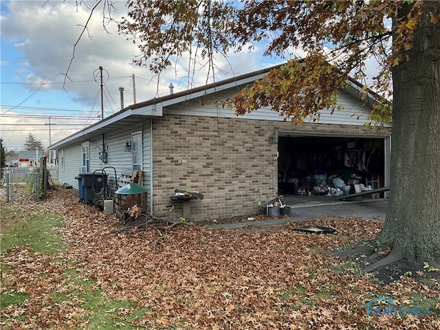 view of property exterior with a garage