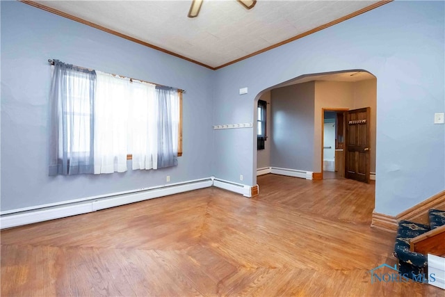 unfurnished room featuring ornamental molding and a baseboard radiator