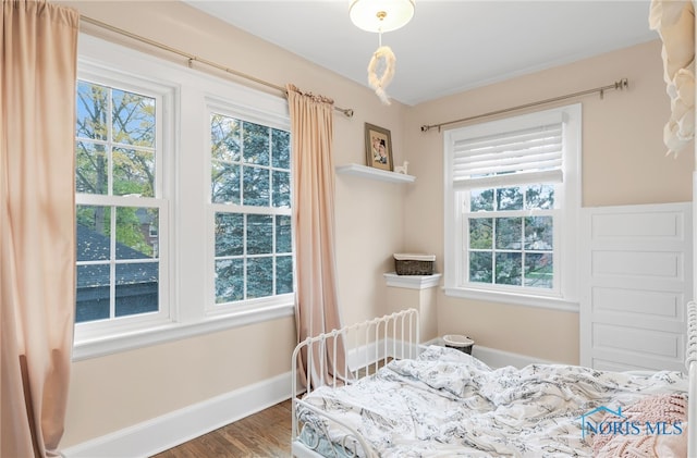 bedroom featuring hardwood / wood-style flooring