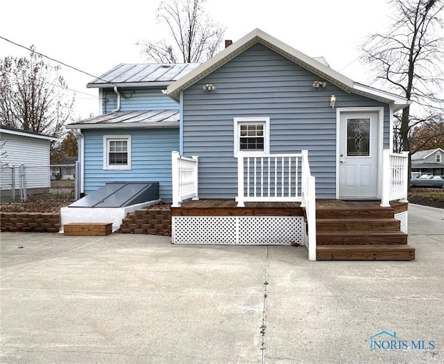 rear view of house featuring a patio area