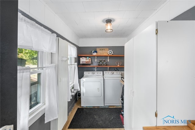 laundry area with washing machine and dryer