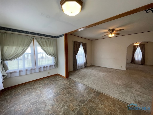 interior space featuring ceiling fan