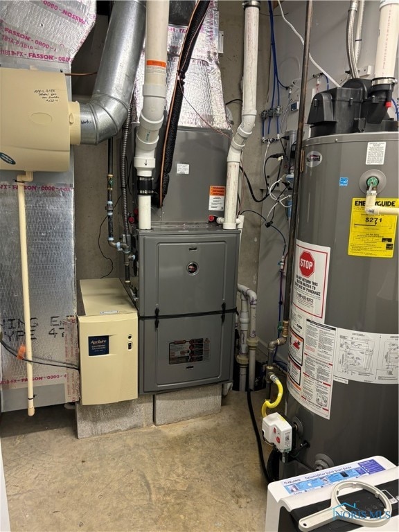 utility room featuring gas water heater