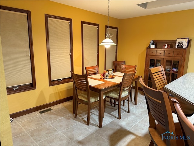 view of tiled dining space