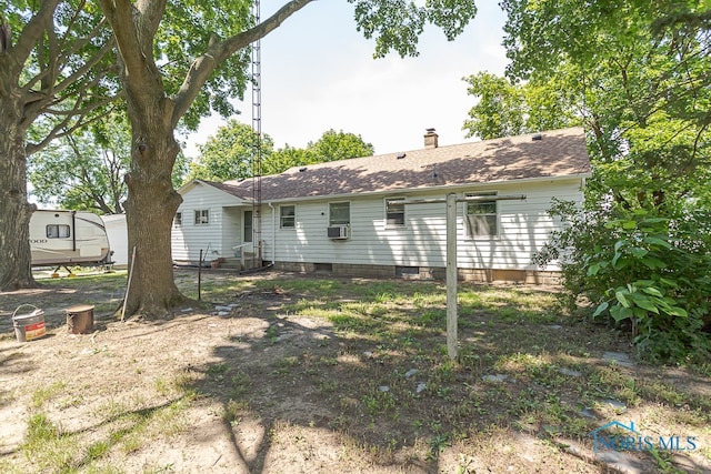 back of house with cooling unit