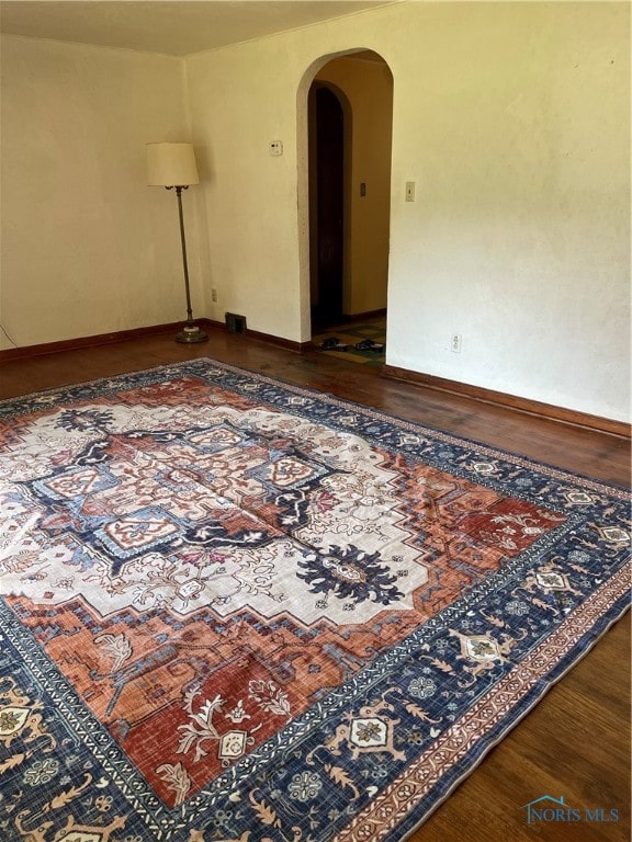 empty room featuring hardwood / wood-style floors