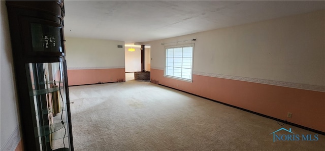 spare room with carpet