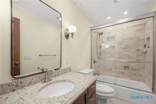 full bathroom with vanity, toilet, combined bath / shower with glass door, and crown molding